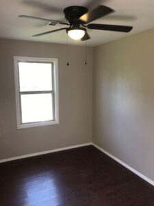 Modern new Construction house master bedroom with Tray ceiling and fan
